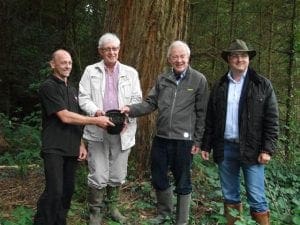 Presenting a redwood seedling to Shane Hollywood were Tony Carey of Crann, Lord Rosse and his son Patrick Parsons at Birr Castle Estate